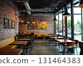 Cozy cafe with brick walls and industrial lamps 131464383