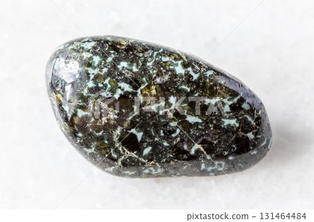 sample of polished gabbro-norite rock on white sample of polished gabbro-norite rock on white 131464484