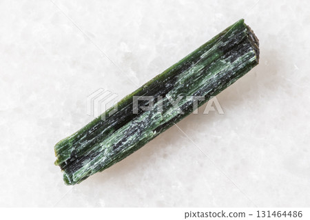 sample of raw chrysotile mineral on white marble 131464486