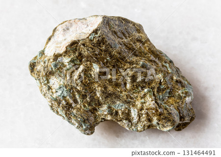 sample of raw lobanovite mineral on white marble 131464491
