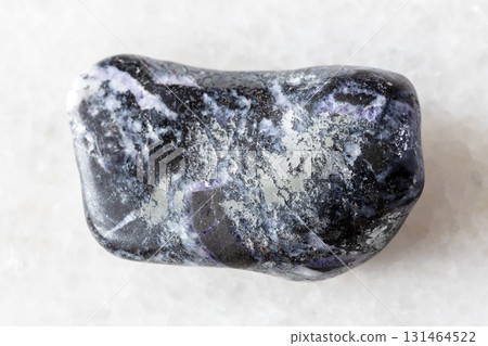 sample of tumbled antimonite mineral on white 131464522