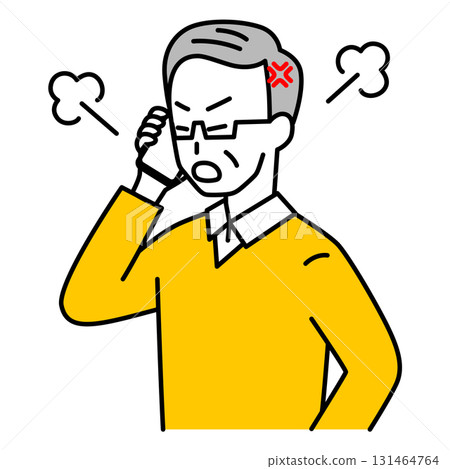 An elderly man getting angry while talking on a smartphone 131464764