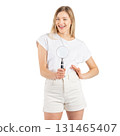 Studio portrait of woman with magnifying glass 131465407