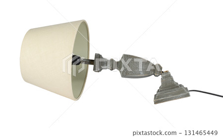 Damaged elegant lamp with a broken base, isolated. The image conveys a sense of malfunction, disuse, or a need for repair. Damaged elegant lamp with a broken base, isolated. The image conveys a sense of malfunction, disuse, or a need for repair. 131465449