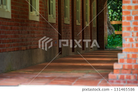 Retro style architectural scenery, antique red brick corridor 131465586