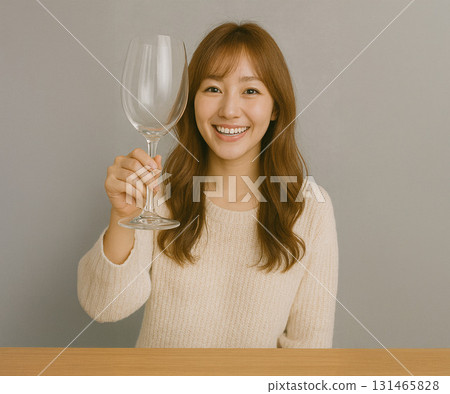 A woman toasting with a relaxed expression 131465828