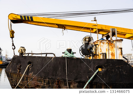 old crane in port in Petropavlovsk-Kamchatsky city old crane in port in Petropavlovsk-Kamchatsky city 131466075