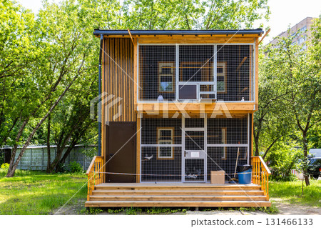 new wooden modern dovecote in city park in summer 131466133
