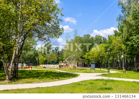 walking pathes and playground inpark in summer 131466134