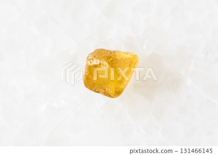 sample of raw jargoon zircon crystal on white 131466145