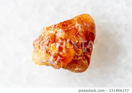 sample of unpolished scheelite mineral on white sample of unpolished scheelite mineral on white 131466157