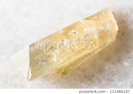 sample of raw danburite mineral on white marble sample of raw danburite mineral on white marble 131466197