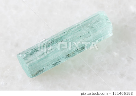 sample of rough aquamarine crystal on white marble sample of rough aquamarine crystal on white marble 131466198