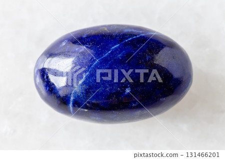 sample of polished lapis lazuli gemstone on white 131466201