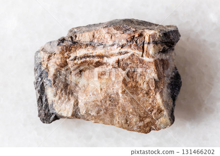 sample of raw rhodonite rock on white marble sample of raw rhodonite rock on white marble 131466202