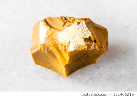 sample of raw yellow mookaite mineral on white sample of raw yellow mookaite mineral on white 131466219