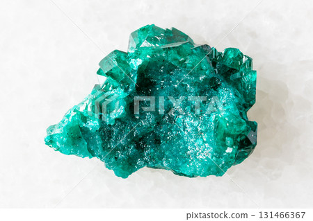 sample of raw dioptase mineral on white marble sample of raw dioptase mineral on white marble 131466367