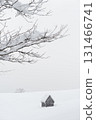 Old Wooden Barn In Foggy Snowy Mountain Village 131466741