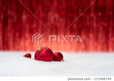 Christmas Background With Red Baubles On Snow And Festive Copy Space 131466744