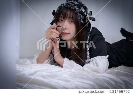 A landmine girl sleeping face down on the bed 131466792