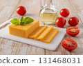 Slised cheddar cheese and tomatoes close-up. 131468031