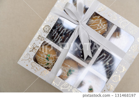 A selection of handmade chocolates in gift boxes A selection of handmade chocolates in gift boxes 131468197