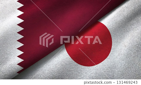 A close up of the flags of qatar and japan overlapping with a textured appearance A close up of the flags of qatar and japan overlapping with a textured appearance 131469243