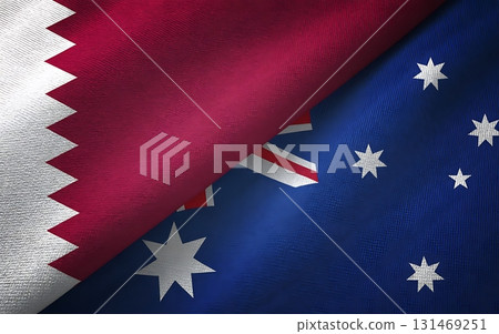 A close up shot showing the flags of qatar and australia overlapping each other nicely 131469251