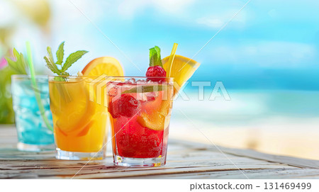 Orange cocktail glass with fruit slice on tropical beach background. banner with copy space. The concept of rest,   131469499