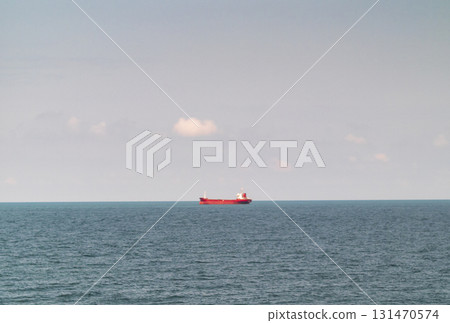Large cargo ship, container carrier in the open sea 131470574