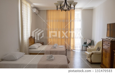 Room in the hotel with old fashioned furniture Room in the hotel with old fashioned furniture 131470583