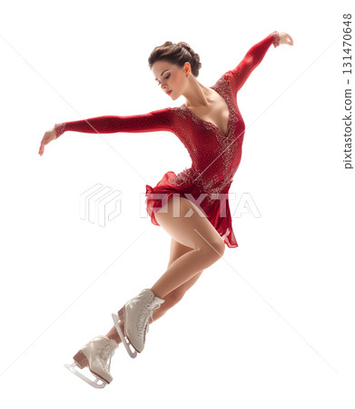 Figure Skater in Red Embellished Costume Striking Dynamic Ice Pose 131470648