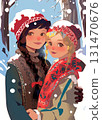 Two teenage girls outdoors in winter, hugging each other and looking at the camera. One brunette and one blonde, both wearing knitted hats. Snow is falling, they appear happy and in love. 131470676