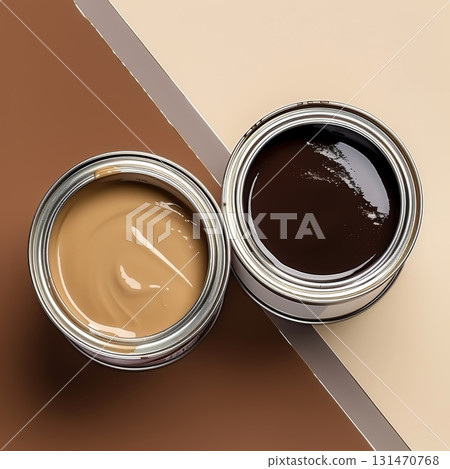 Two Paint Cans Showing Contrasting Brown and Beige Colors on Matching Background 131470768