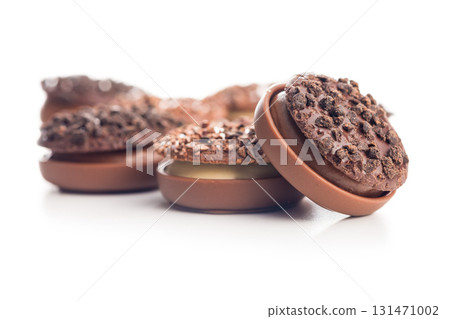Sweet chocolate pralines. Chocolate candies isolated on white background. Sweet chocolate pralines. Chocolate candies isolated on white background. 131471002