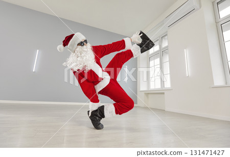 Santa Claus breakdancing wearing red suit and cute funny sunglasses, humorous and energetic dancer Santa Claus breakdancing wearing red suit and cute funny sunglasses, humorous and energetic dancer 131471427