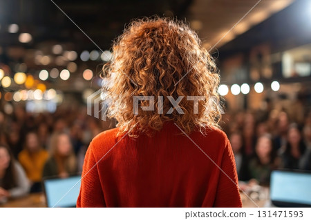 Student founder presents innovative ideas at a pitch event in a busy venue Student founder presents innovative ideas at a pitch event in a busy venue 131471593