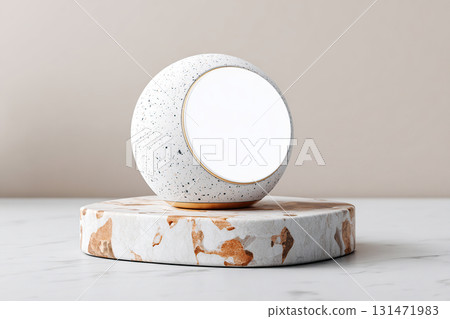 Speaker set on a marble island presents a minimalist design for any environment 131471983