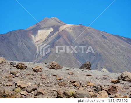 A scenic view of a volcanic mountain under a clear blue sky in Teide National Park, Tenerife 131472802