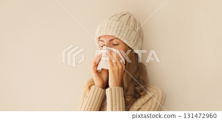 Sick exhausted young woman sneezing blow nose using tissue, unhealthy suffering girl feels unwell 131472960