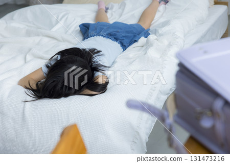 A depressed elementary school girl at home A depressed elementary school girl at home 131473216
