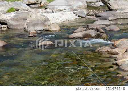 River flowing between rocks 131473348