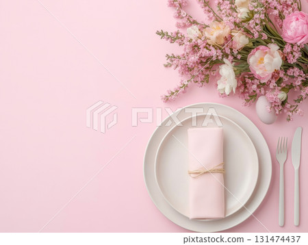 Light Minimal pink purple speckled Easter eggs with ceramic tableware and cherry blossoms on white linen table for top view, flat lay fresh spring decor concept. 131474437