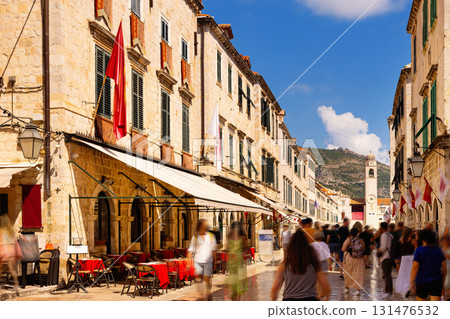 Stone-paved streets between old houses in Dubrovnik Stone-paved streets between old houses in Dubrovnik 131476532
