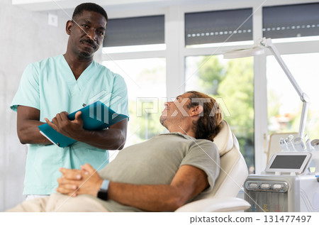 doctor discusses treatment options doctor discusses treatment options 131477497