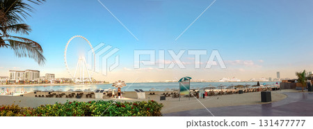 Panoramic view of Bluewaters Island, famous Ferris Wheel, JBR beach area, UAE. Aerial sky at highest buildings in central Dubai Marina, United Arab Emirates 131477777