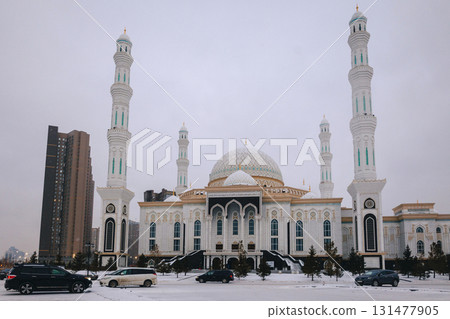 Panoramic view of snow-white modern Hazaret Sultan mosque early morning, Nur-Sultan, Astana, Kazakhstan. High quality photo 131477905