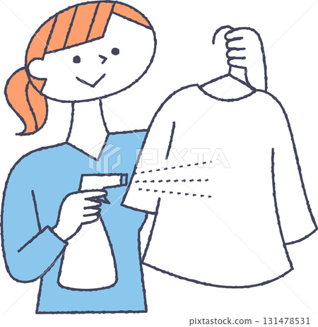 A woman spraying deodorizing spray on clothes 131478531