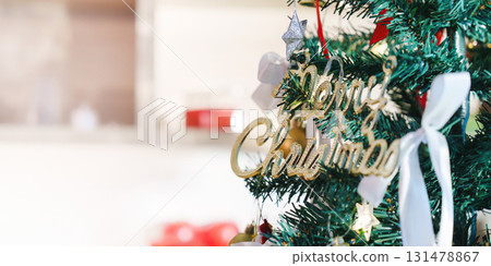 Christmas Tree Decoration with 'Merry Christmas' Sign 131478867