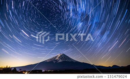CG illustration of a starry sky with shooting stars and meteor showers, Mt. Fuji, the Milky Way, and star trails 131479024